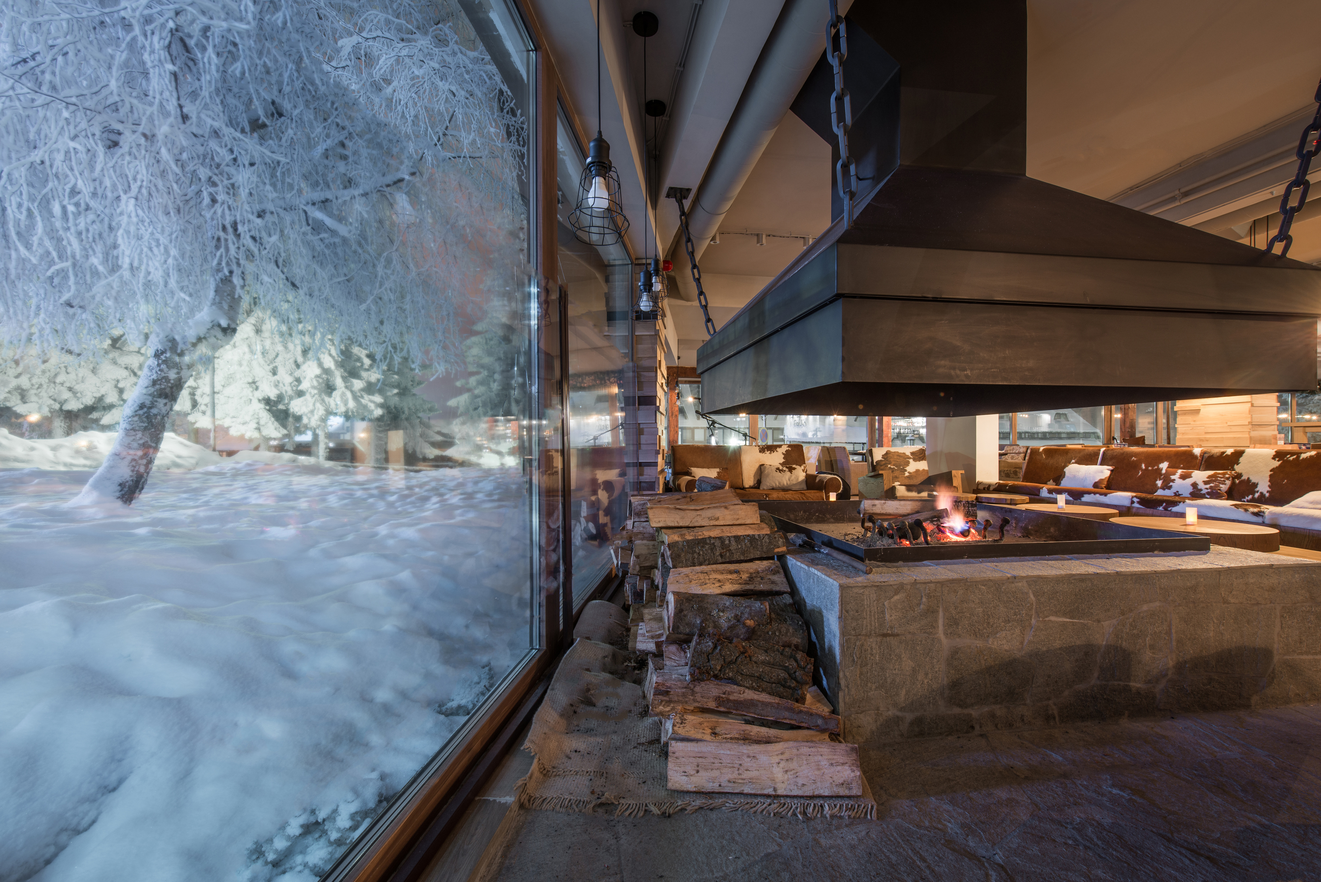 Big window in winter night and restaurant interior